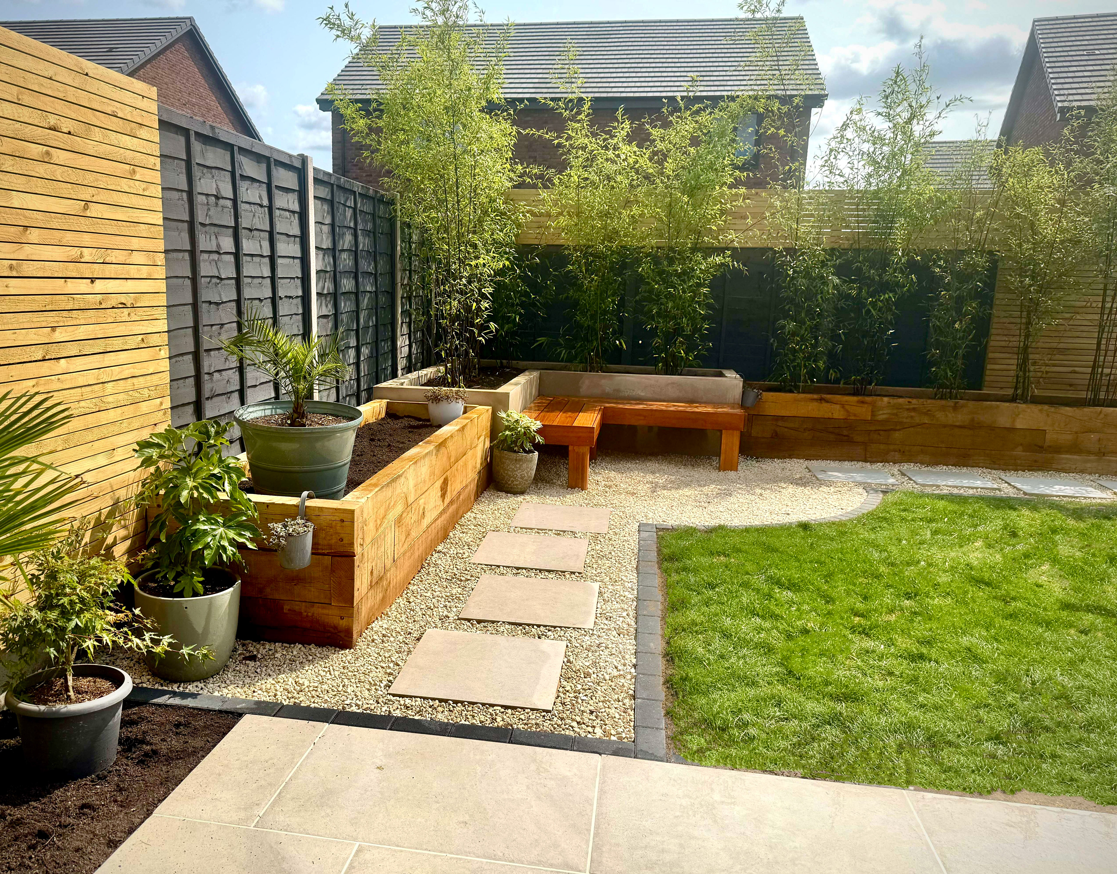 A low-maintenance Hassocks garden with evergreen structure and resilient planting